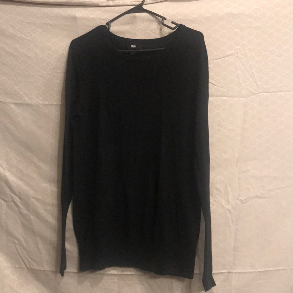 Long sleeve, crew neck sweater.